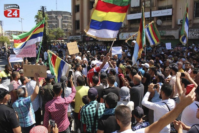 Hundreds rally in south Syria’s biggest protest in weeks