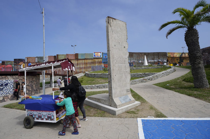 Berlin Wall relic gets a ‘second life’ on US-Mexico border as Joe Biden adds barriers