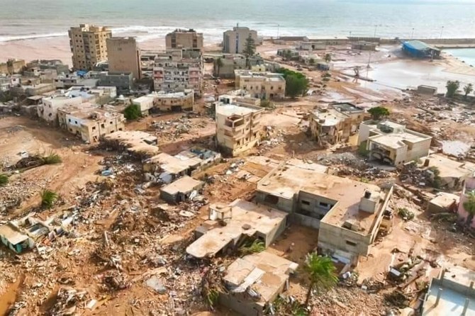 Libyan city buries thousands in mass graves after flood, while mayor says death toll could triple