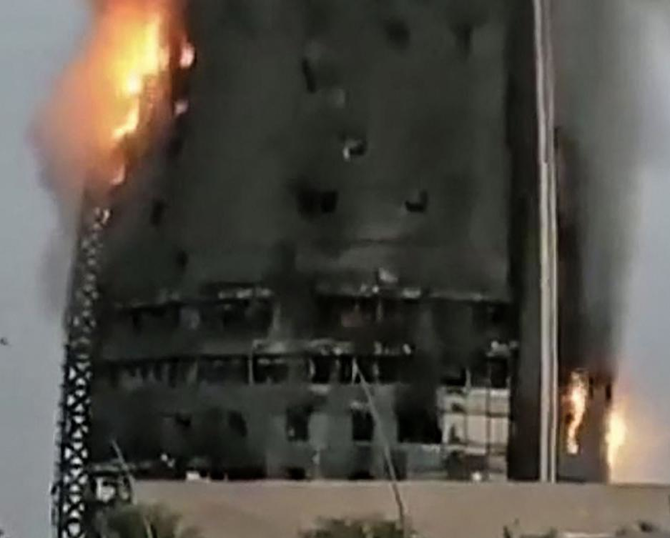 Grab from UGC video posted on the X platform reportedly shows a raging fire inside the Greater Nile Petroleum Oil Company Tower.