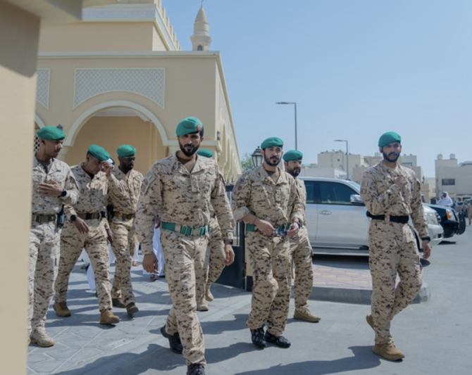 Bahraini military personnel are pictured after performing funeral prayers for their colleagues who were killed on Monday. (BNA)