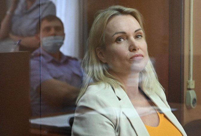 Russian journalist who staged TV war protest handed 8-1/2 year jail term in absentia