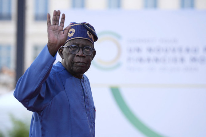 Nigeria’s president faces new challenge to election victory as opposition claims he forged diploma