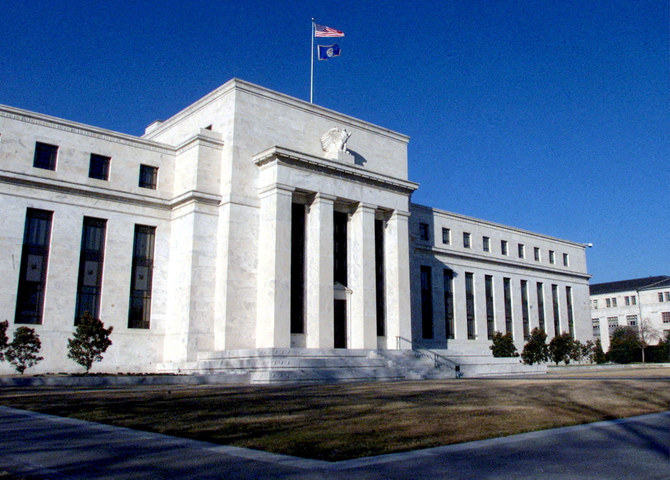 Fed keeps interest rates unchanged, acknowledges economic strength