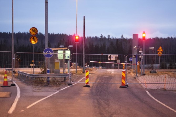 Dozens of migrants wait at Finland-Russia border after Helsinki blocks crossings