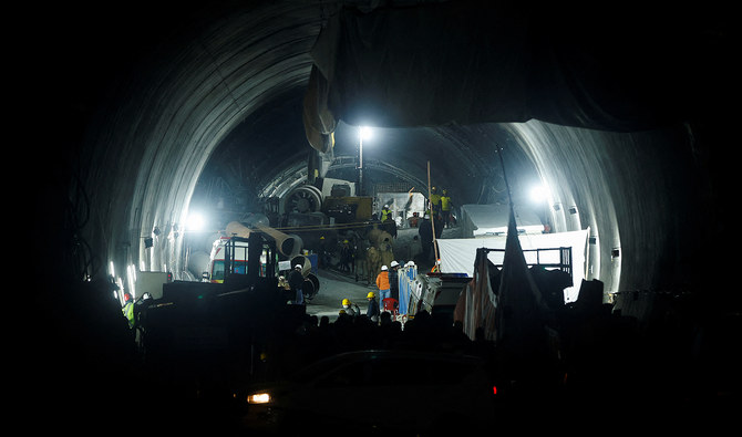 Indian rescuers break through debris to reach 41 men trapped in tunnel