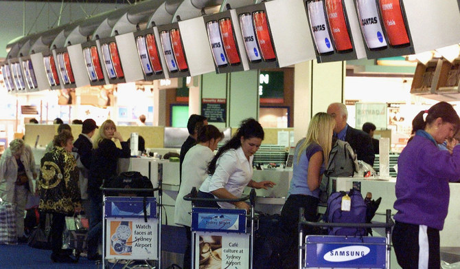 Passengers check in at the refurbished Sydney International Airport Terminal. (AFP file photo) 
