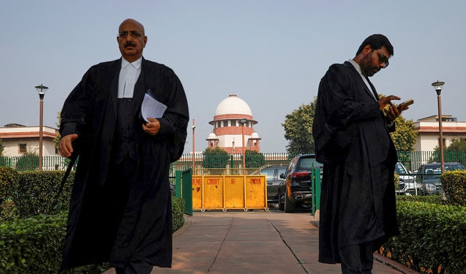 India’s top court upholds end of special status for Kashmir, orders polls