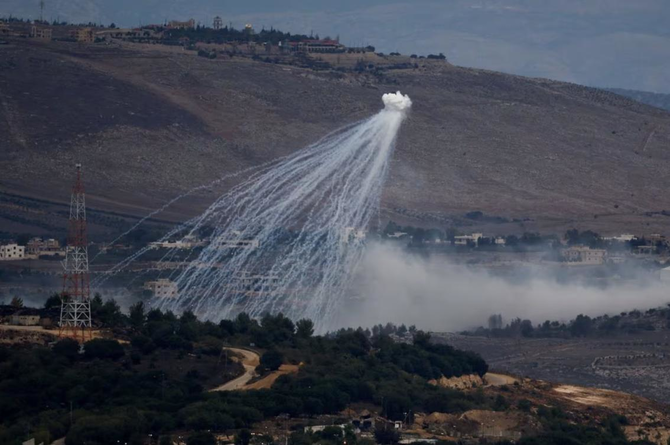 White phosphorus fired by the Israeli army to create a smoke screen, is seen on the Israel-Lebanon border in northern Israel.