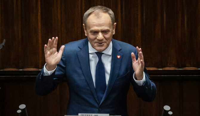 Donald Tusk speaks after he was nominated to be new prime minister in the Polish Parliament, Warsaw on December 11, 2023. (AFP)