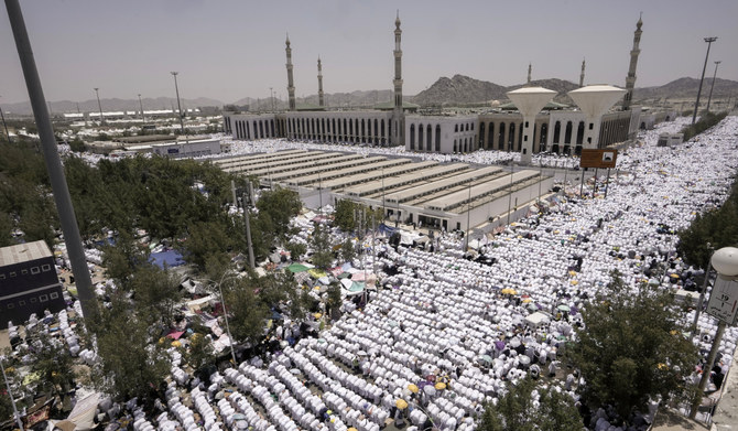 Muslim pilgrims pray outside Namira Mosque in Arafat near the holy city of Makkah, Saudi Arabia, June 27, 2023. (AP)
