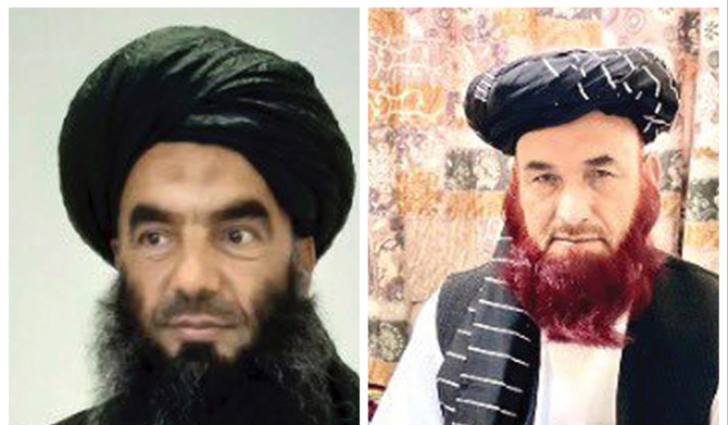 Afghan prisoners Abdul Zahir Saber (left) and Abdul Karim. (AP file photo)