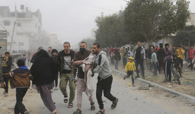 Palestinians evacuate survivors of the Israeli bombing in Rafah, Gaza Strip. (AP file photo)