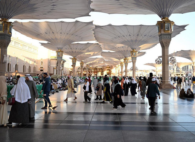 People walk in the courtyard of the Prophet’s Mosque in Madinah. (File/SPA)