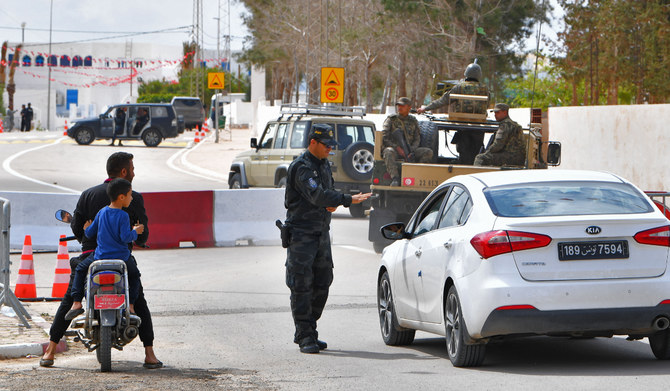 Tunisian forces secure an area near the Ghriba synagogue following a shootout on the resort island of Djerba on May 10, 2023. 