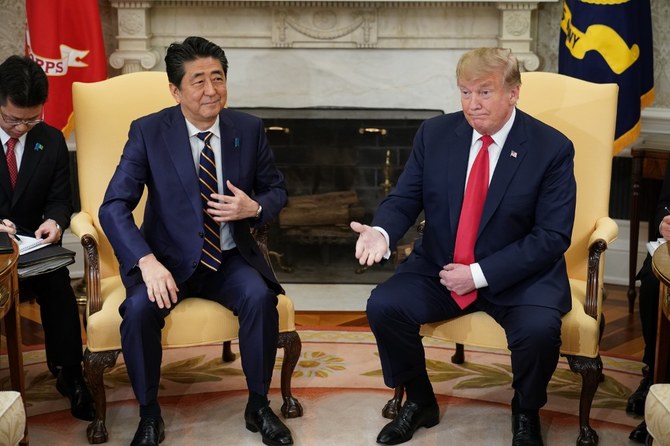 Abe to continue charm offensive as Trump visits Japan