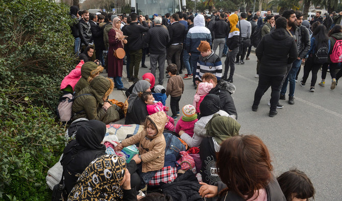 In this file photo, Syrian refugees prepare to board buses in Istanbul, Turkey, on the way to the Greek border.  Turkey’s geopolitical position between Europe, the Middle East, Central Asia, and the Caucasus makes it indispensable to the EU. (AFP file)