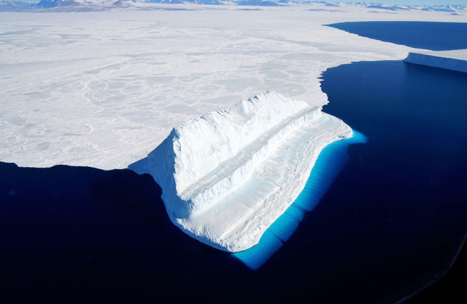 This file photograph shows a NASA image released on December 20, 2017, and taken November 29, 2017, by Operation IceBridge during a flight to Victoria Land, shows an iceberg floating in Antarctica's McMurdo Sound.  (AFP)