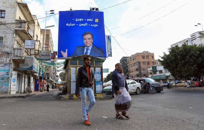 A billboard in the Yemeni capital Sanaa shows a portrait of Lebanese Information Minister George Kordahi, whose defense of the Houthis' "war crimes" has made him an instant hero to the Iran-backed terror militia. (AFP photo)
