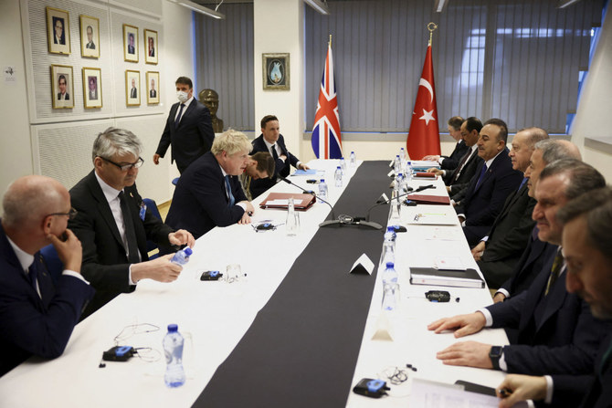 Turkey's President Tayyip Erdogan attend a bilateral meeting during a NATO summit on Russia's invasion of Ukraine, at the alliance's headquarters in Brussels on March 24, 2022. (Henry Nicholls/Pool via AP)