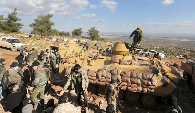 Turkish troops and pro-Turkey Syrian fighters try to take control of Bursayah hill. (AP)
