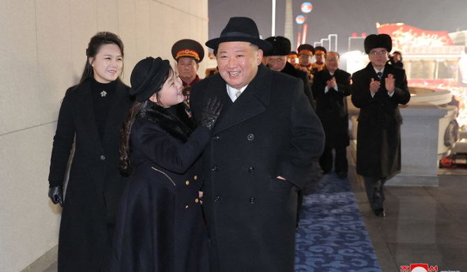 North Korea's leader Kim Jong Un (R), his daughter presumed to be named Ju Ae (C) and wife Ri Sol Ju (L) in Pyongyang. (AFP)