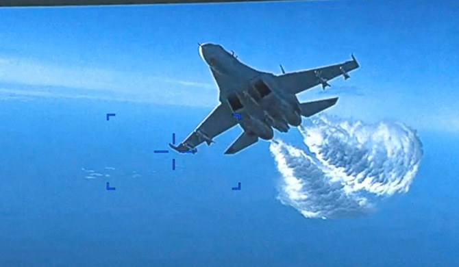 A Russian Su-27 aircraft dumps fuel while flying upon a US Air Force intelligence, surveillance over the Black Sea. (REUTERS)