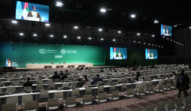 Delegates during a plenary session at the COP28 UN Climate Summit, Dec. 9, 2023, in Dubai, United Arab Emirates. (AP)