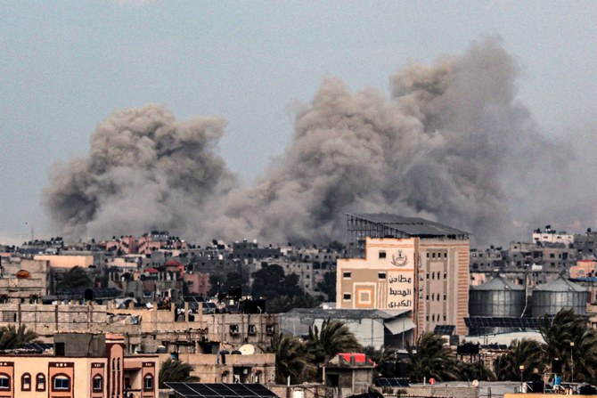 Smoke rises over buildings in Khan Younis in the distance, following Israeli bombardment on Feb. 05, 2024 (File/AFP)