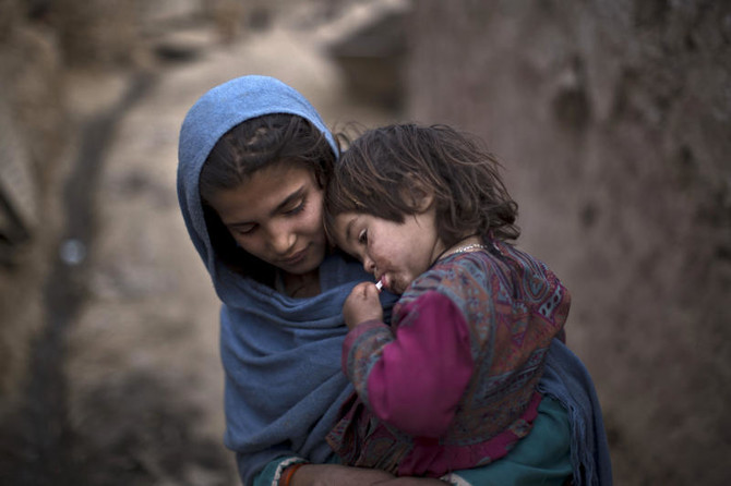 Bombs kill 11 Pakistan police guarding polio teams