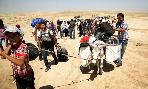 Syrian refugee ‘river’ crosses into Iraq: UN
