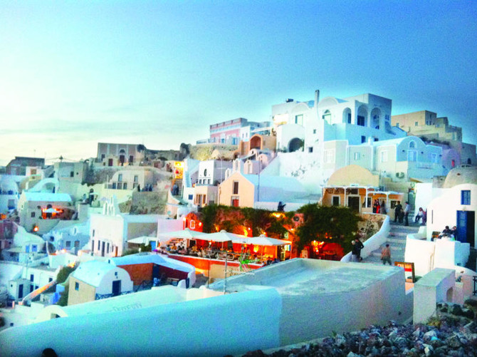 Traditional white buildings facing Mediterranean Sea in Oia